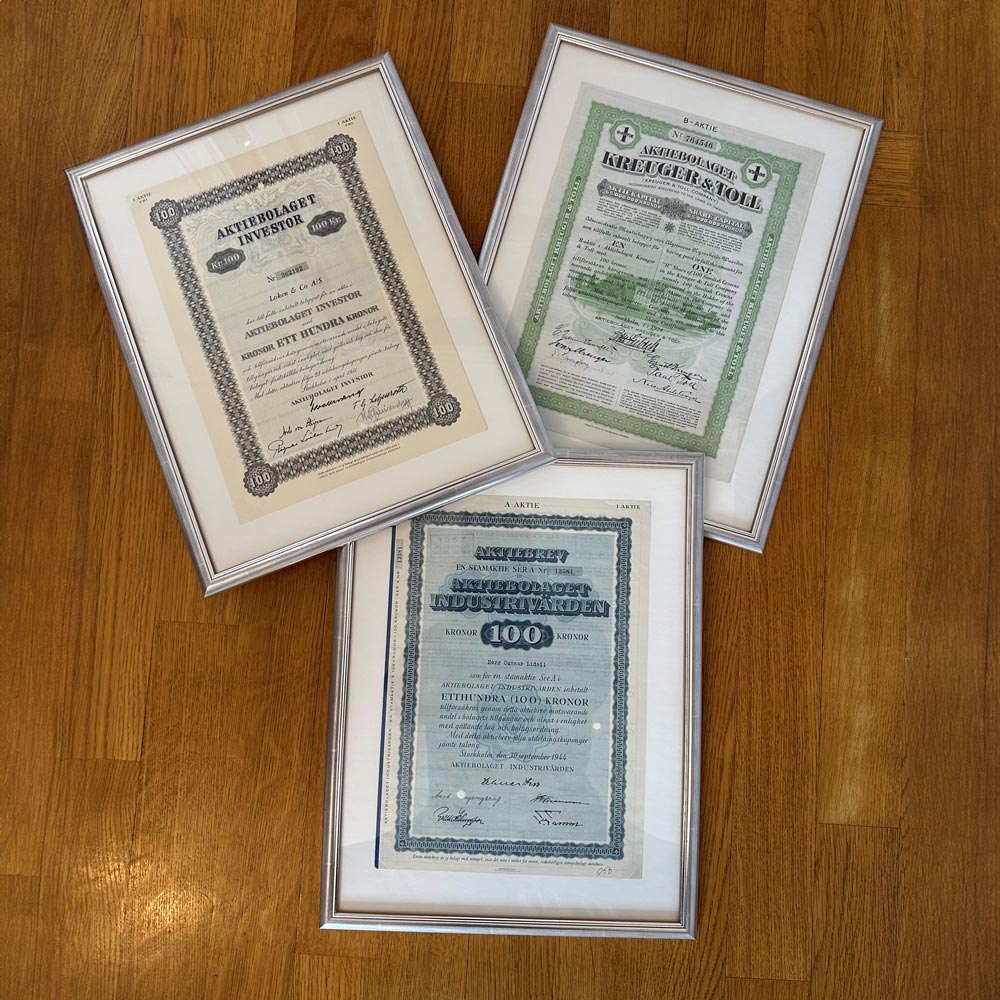 Three share certificates